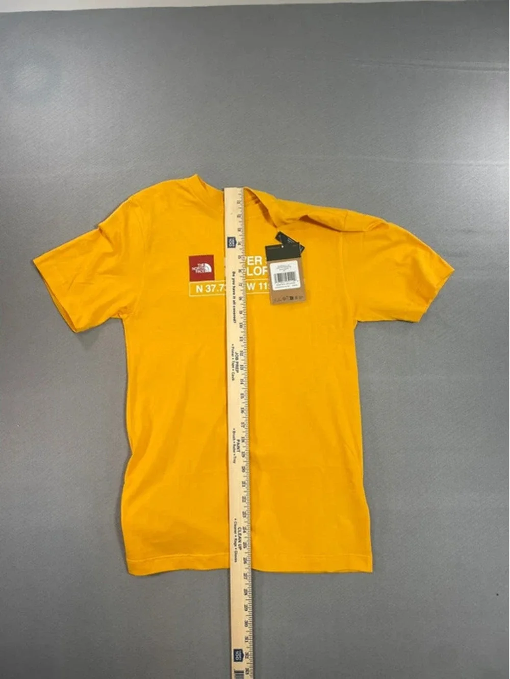 The Northface yellow “Never stop exploring” T-shirt Size XS - Picture 4 of 7